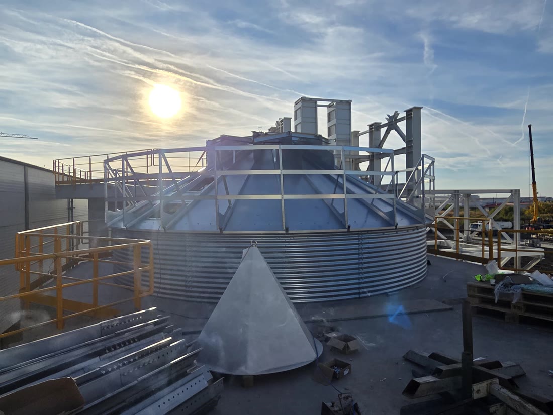 Conical roof of the pellet silo under assembly, with railing and access platform, at Biotim Timișoara